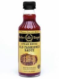 Peter Luger bottle front view showing label and rich sauce for flavorful steaks
