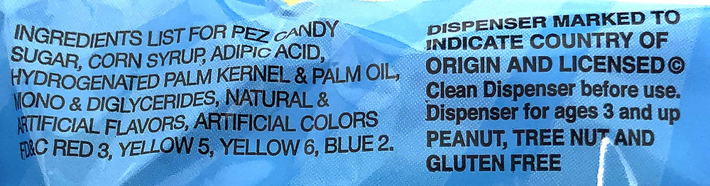 PEZ dispenser opened with two candy refills visible for immediate use