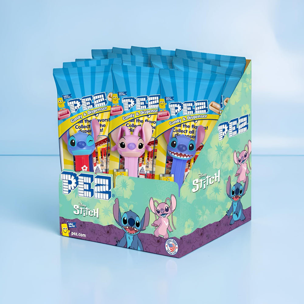 Hand holding a Stitch PEZ dispenser for scale and easy party favor placement
