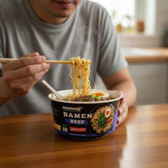 PhoLicious bowl top view with broth and noodles ready to eat