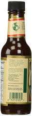 Pickapeppa sauce spooned on crackers with cream cheese emphasizing versatile flavor