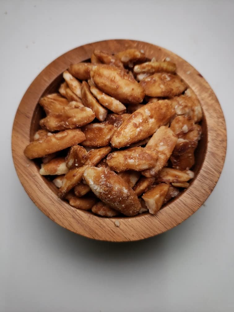 Pili Hunters nuts in bowl displaying golden roasted texture and ready-to-eat convenience