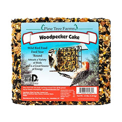 Pine Tree Farms 2.5 lb seed cake beside a ruler showing scale and generous serving size