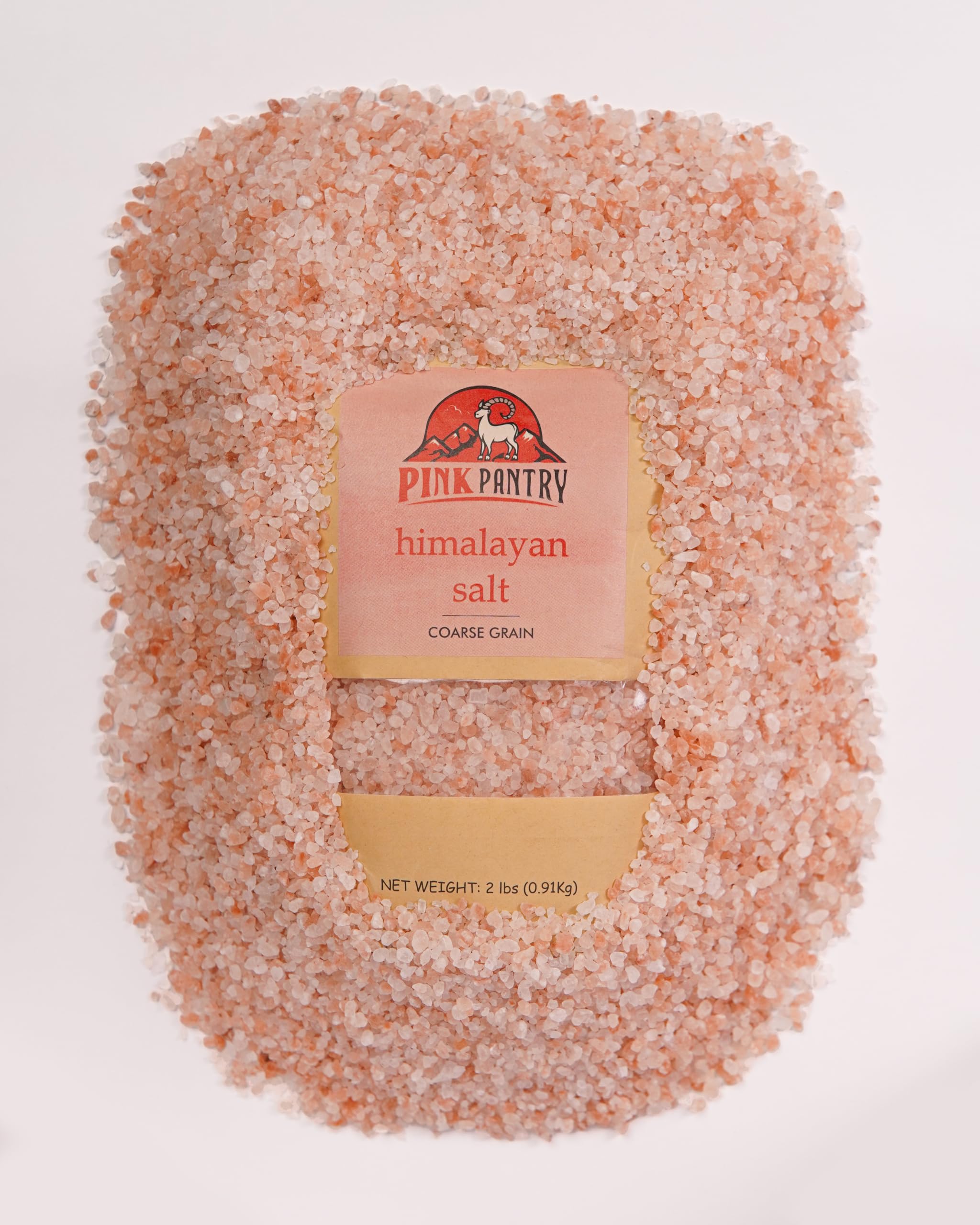 Pink Pantry sprinkled on grilled steak giving visible finishing crunch and flavor boost