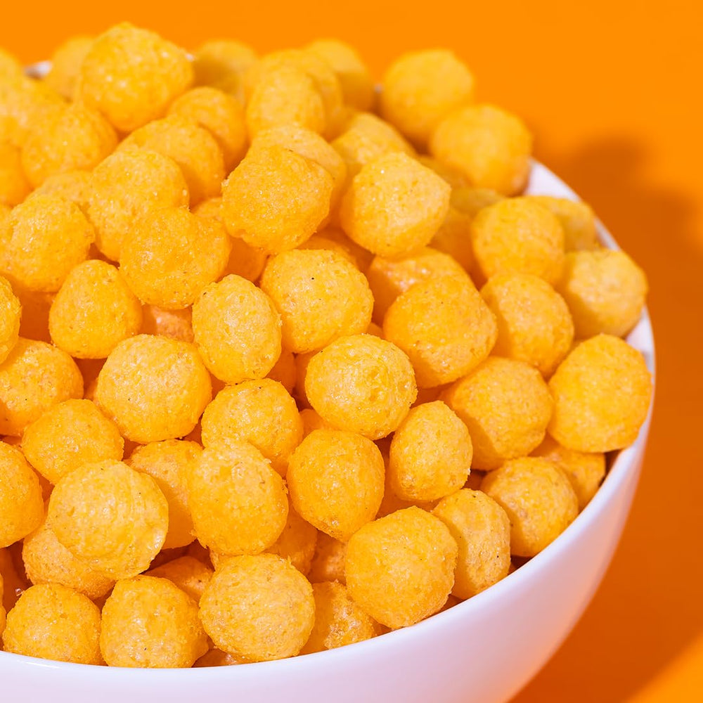 Pipcorn open bag revealing cheese balls for immediate snacking appeal