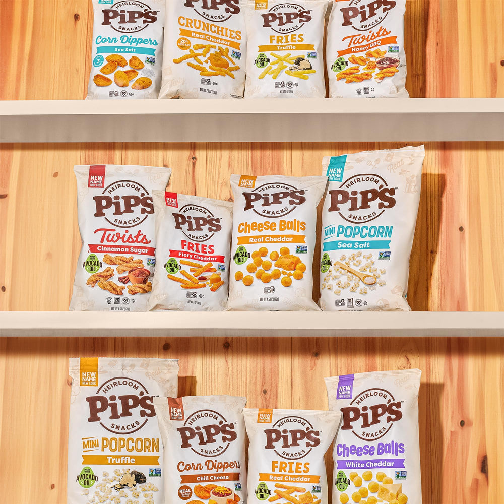 Pipcorn truffle mini popcorn on a couch for a cozy movie-night snack