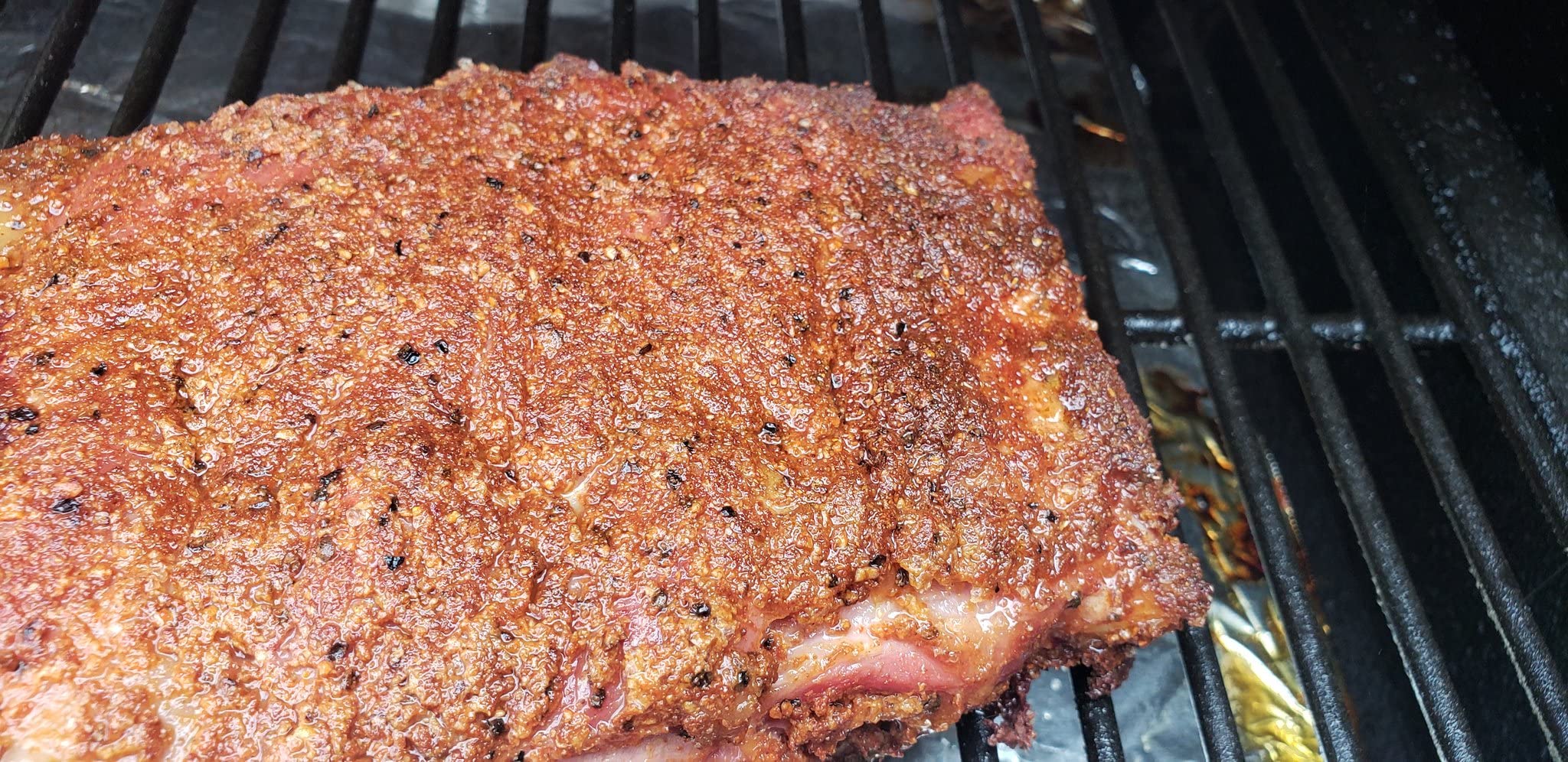Pit Beast rub-seasoned grilled steak plated for enhanced flavor