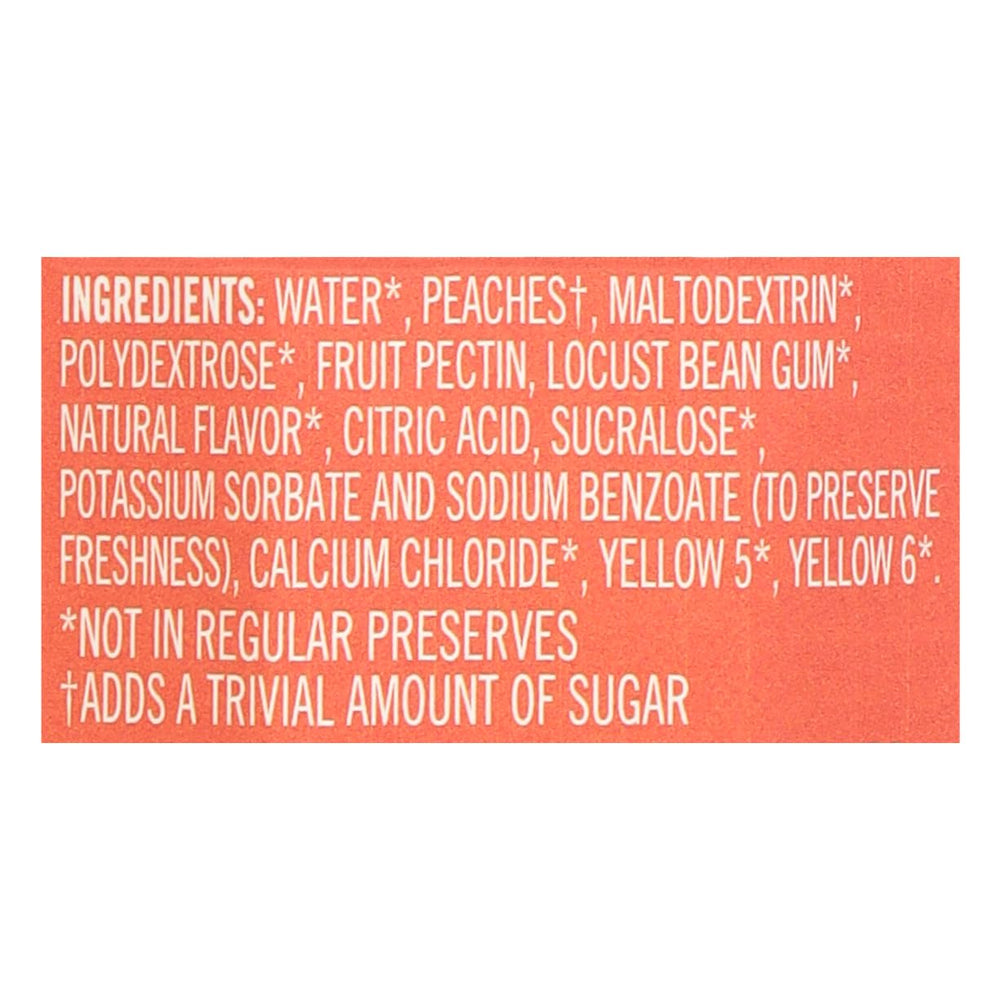 Polaner peach jam jar beside fruit showing jar size and pantry-ready benefit