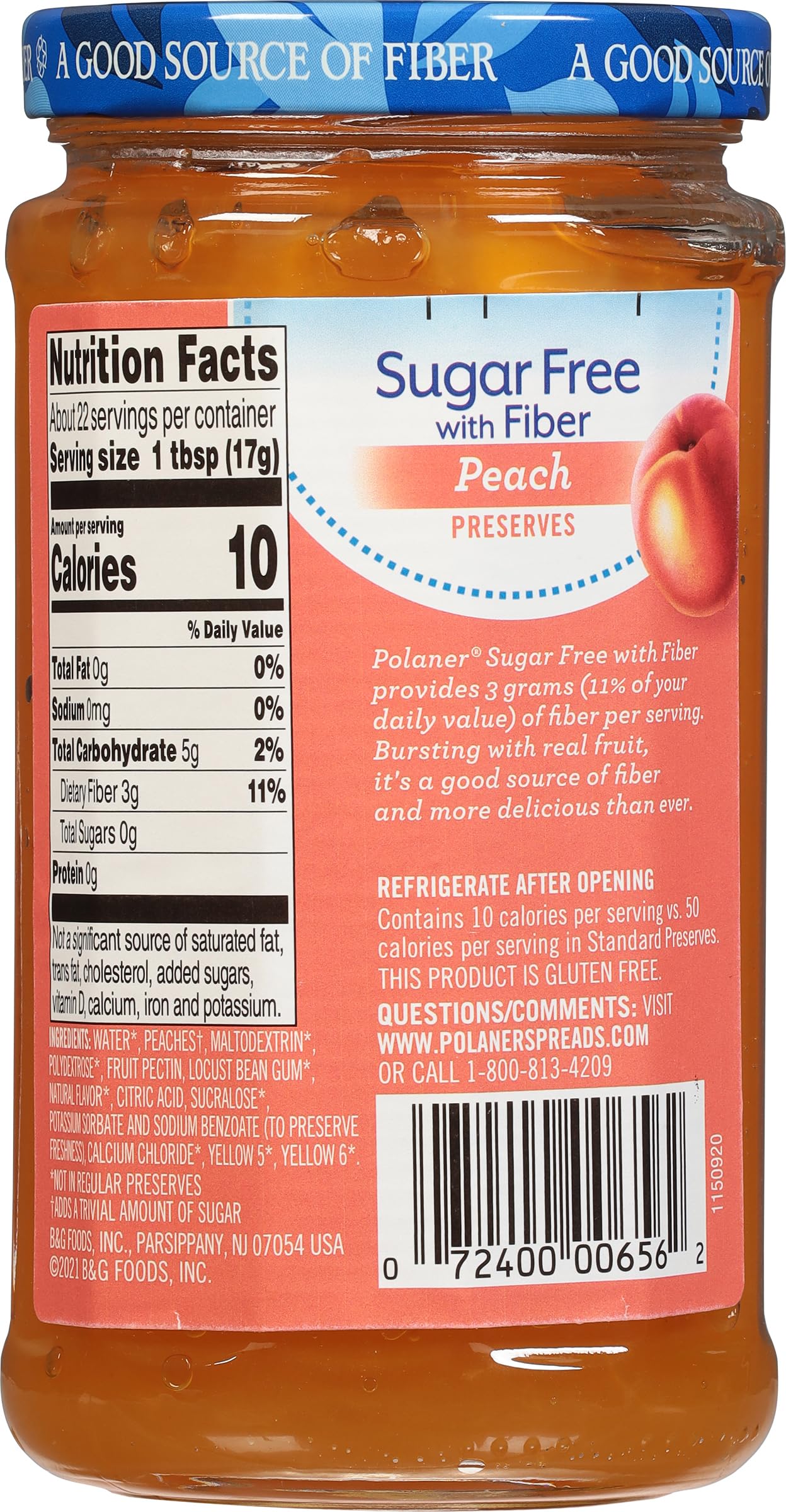 Spoon scooping Polaner peach jam showing smooth texture and easy spreading