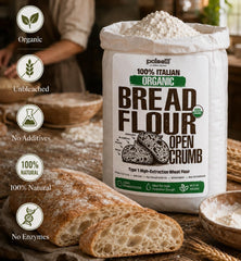 Hand stretching dough made with Polselli flour showing extensibility benefits