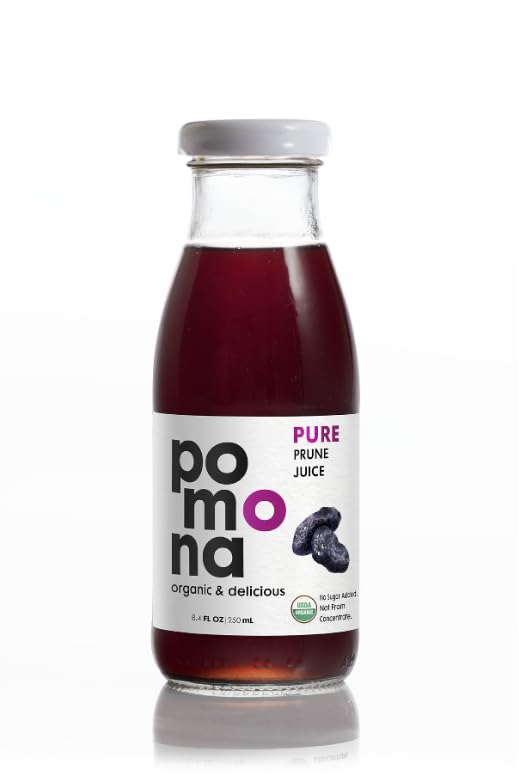 Pomona Organic prune juice poured into glass with sparkling water for a refreshing mix