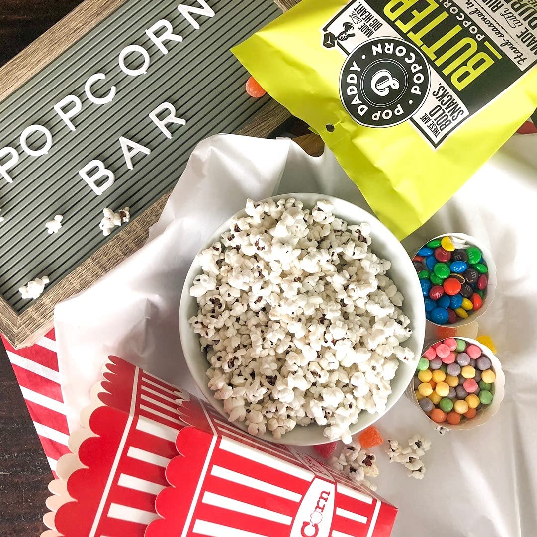 POP DADDY ·POPCORN· close-up on kernel texture showing light, crisp seasoning benefit