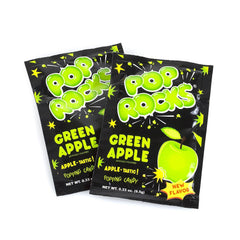 Close-up of Pop Rocks apple candy in mouth capturing fizzing, fun sensation