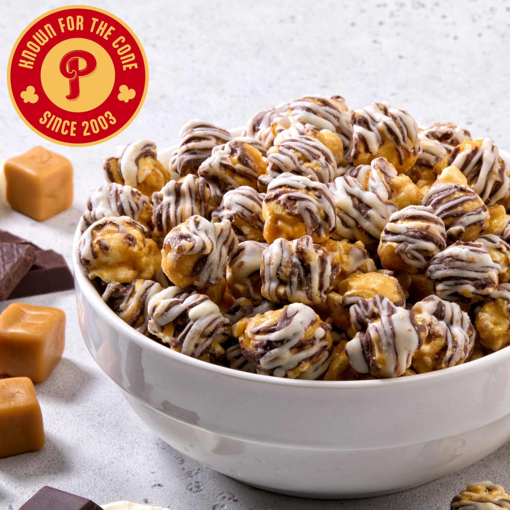 Popcornopolis zebra popcorn on party table as colorful snack option for guests
