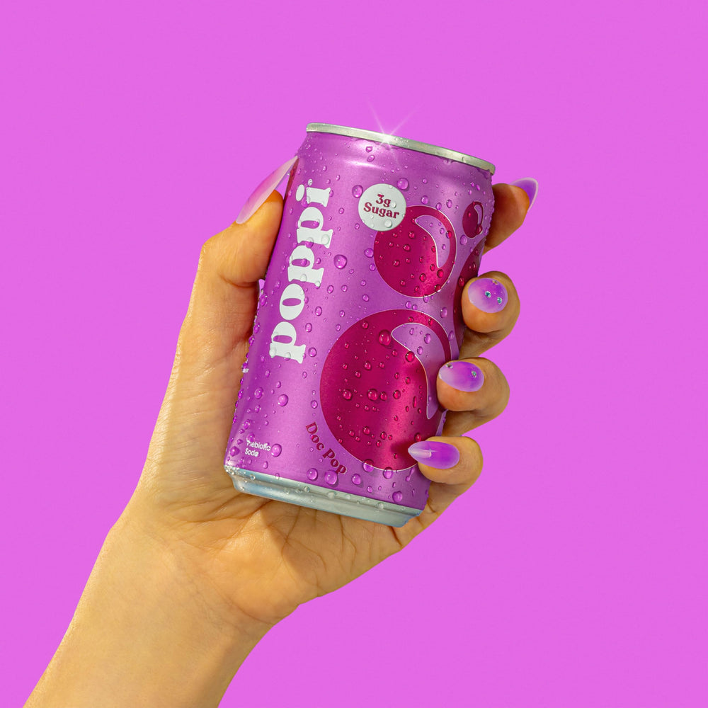 Poppi Doc Pop mini cans on a table at a party showing easy serving and crowd appeal