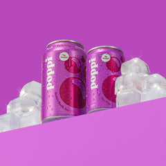 Close-up of Poppi Doc Pop can texture and condensation illustrating refreshing chill
