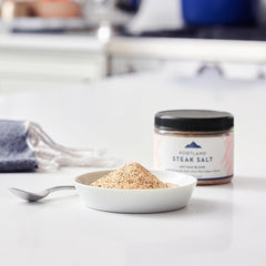 Portland Salt Co sprinkled on seared steak highlighting crust development and savory flavor