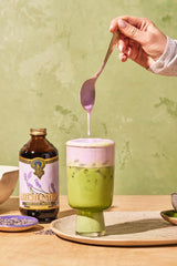 Portland Syrups pouring stream into glass demonstrating smooth mixability and quick blending