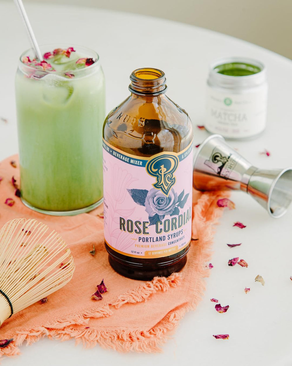 Portland Syrups rose cordial stirred into sparkling soda glass for refreshing nonalcoholic beverage benefit