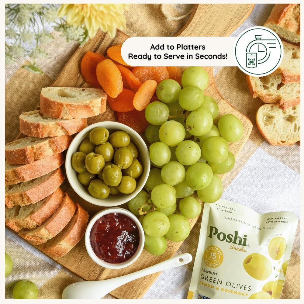 POSHI fresh lemons and rosemary beside olives, natural ingredient focus