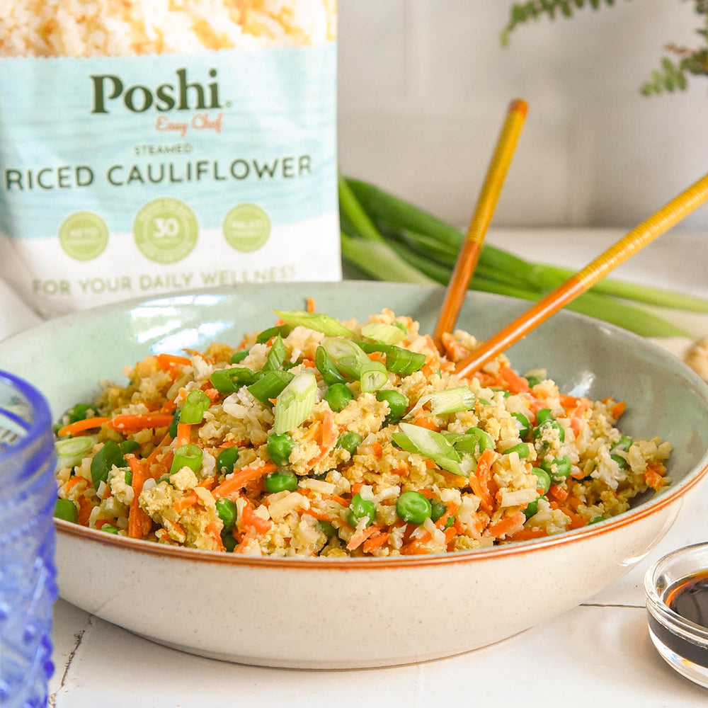 Poshi on picnic table showing portable, shelf-stable meal option
