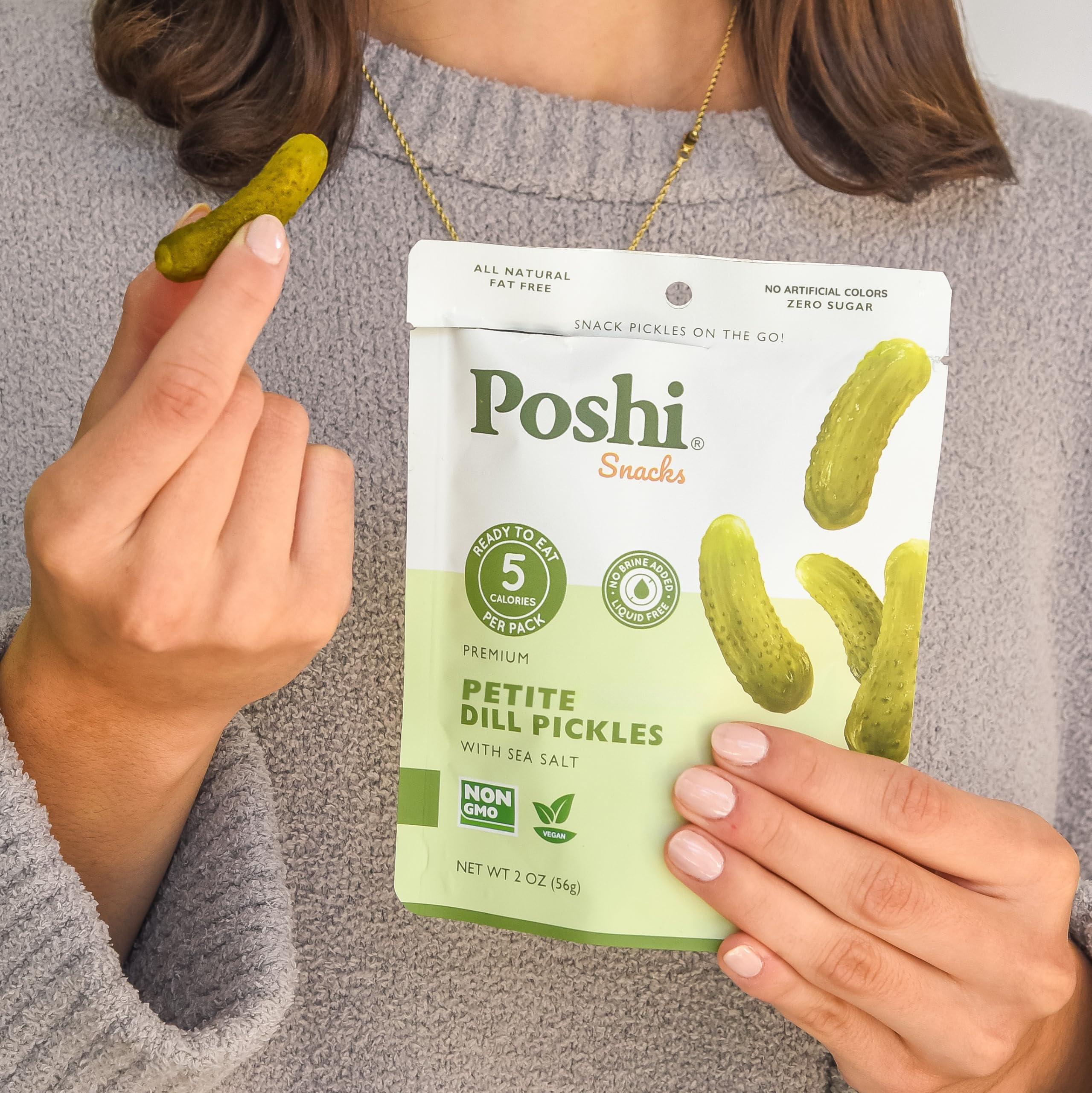 Poshi ten pouches stacked to show pack quantity and easy storage benefit