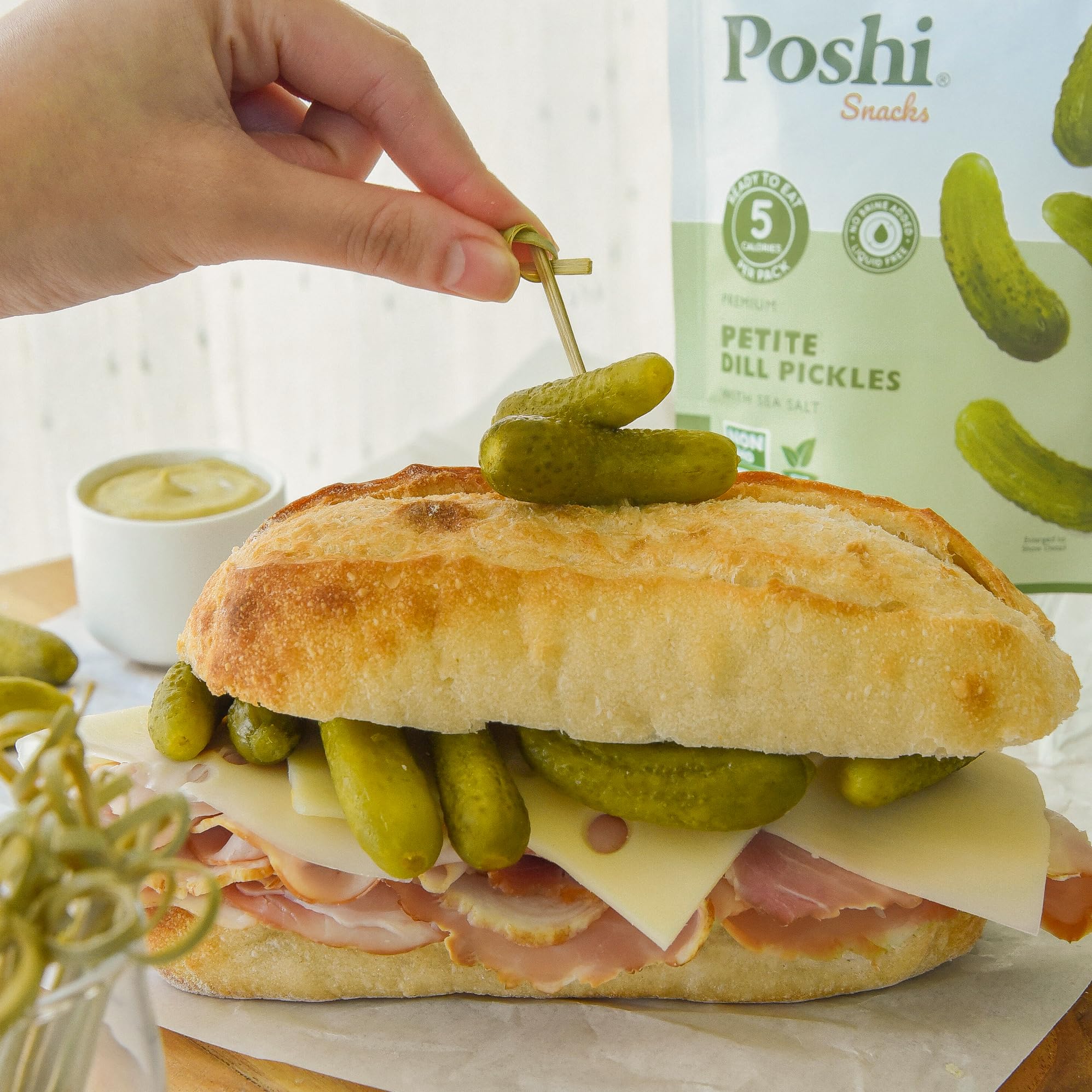 Poshi pickle paired with a sandwich demonstrating garnish and flavor boost