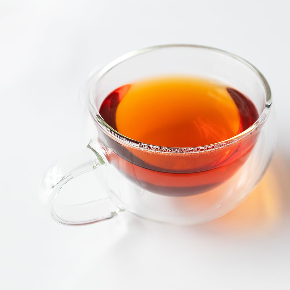 Product label close-up showing Positively Tea organic and Kosher certifications for trusted sourcing