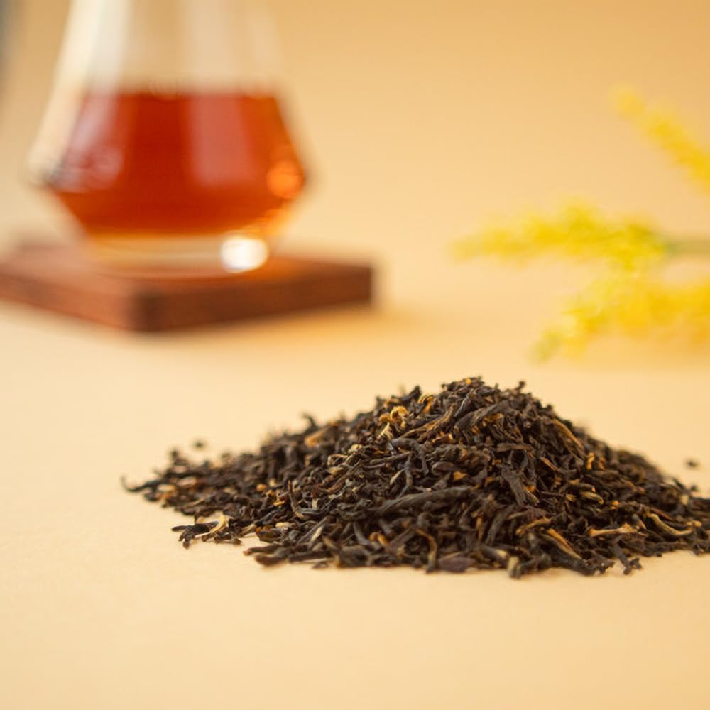 16-ounce Positively Tea bag beside common objects to show size and value for frequent drinkers