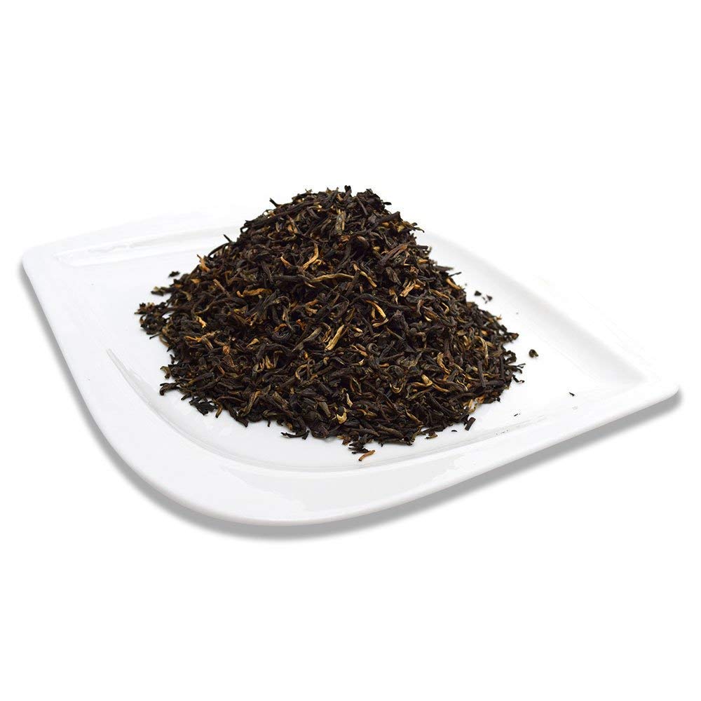 Pitcher of cold-brewed Positively Tea iced tea demonstrating smooth flavor for summer serving