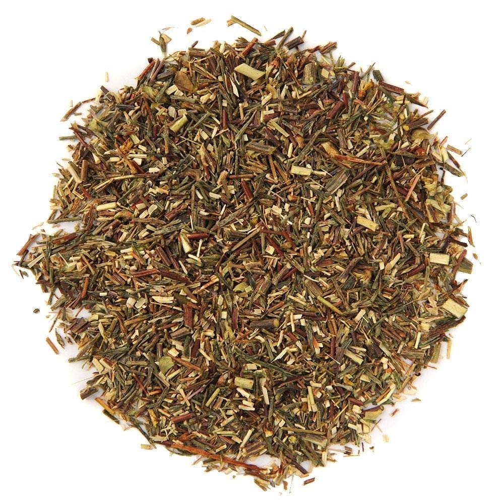 Organic Positively Tea Company iced tea in glass with lemon showing refreshing caffeine-free option