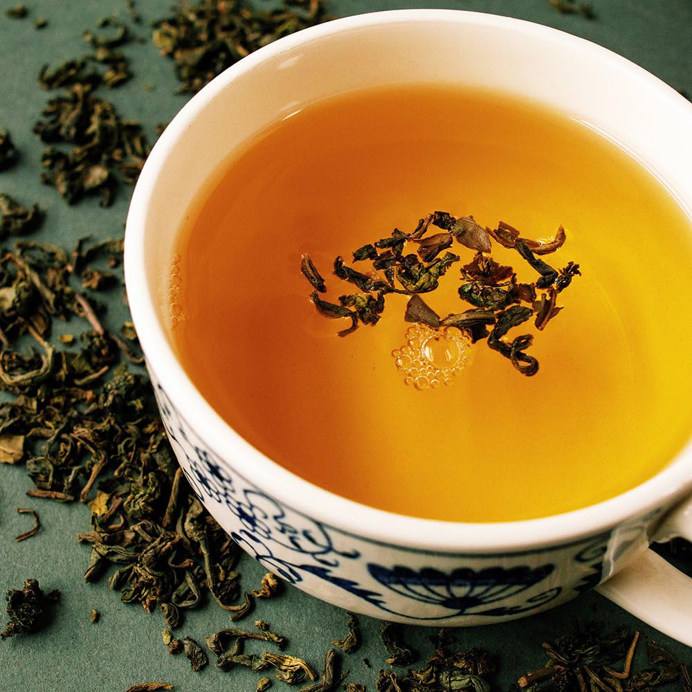 Organic Positively Tea Company infuser in use demonstrating easy loose-leaf brewing