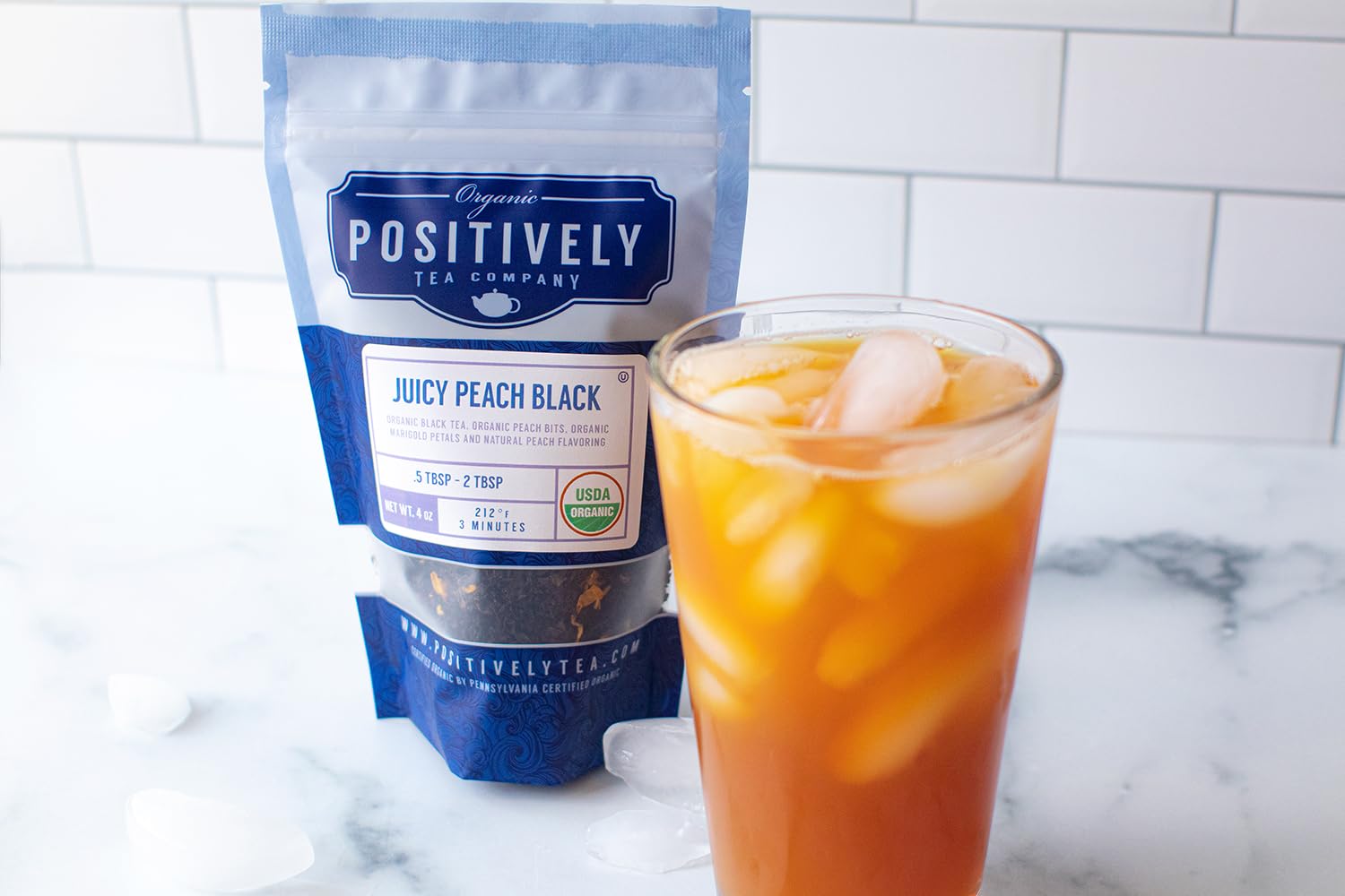 Positively Tea ingredient label highlighting USDA Organic and Non-GMO assurances