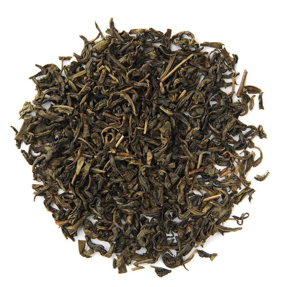 Organic Positively Tea Company label close-up showing USDA Organic and Kosher certifications