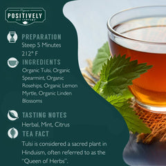 Close-up of Positively Tea loose-leaf tulsi, spearmint and rosehip showing leaf texture and freshness benefit