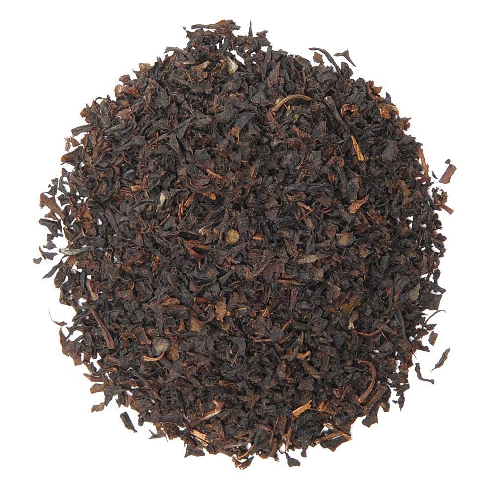 Positively Tea bag close-up of USDA Organic and Kosher labels, certified sourcing benefit