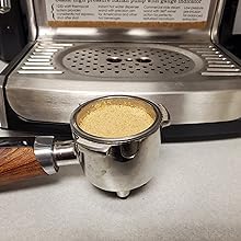 POVERTY BAY COFFEE CO. beans beside a scale showing 2lb quantity and value