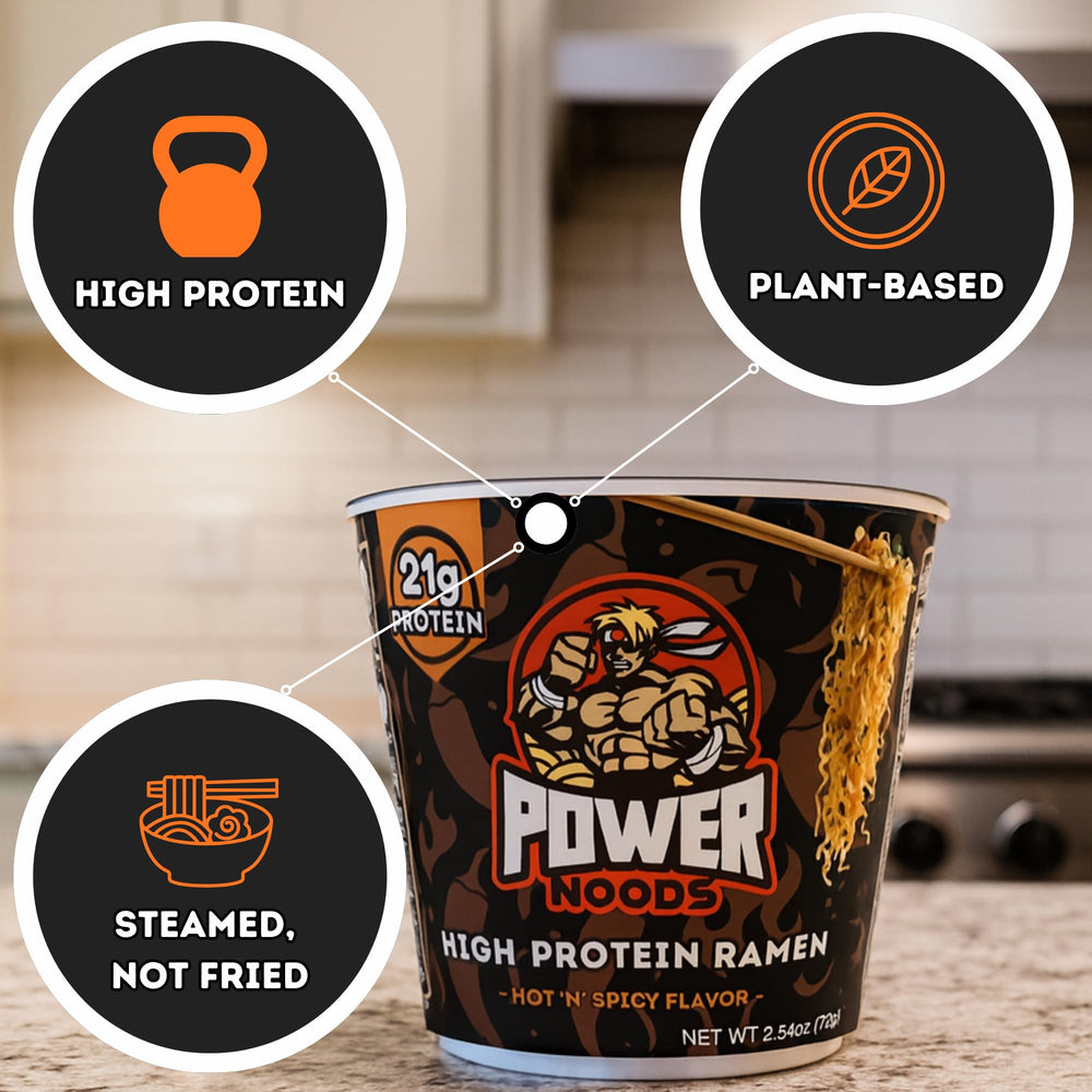Power Noods top-down view of hot broth highlighting rich spicy appeal