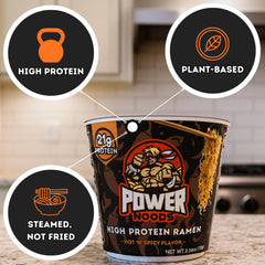 Power Noods top-down view of hot broth highlighting rich spicy appeal