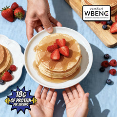 POWKAKES stack of fluffy pancakes plated illustrating protein-packed breakfast