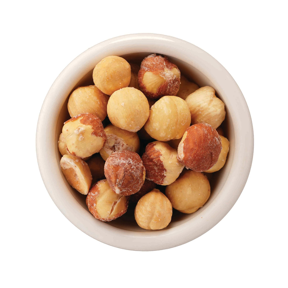 Premium Growers close-up of dry-roasted hazelnut texture showing crunchy golden roast