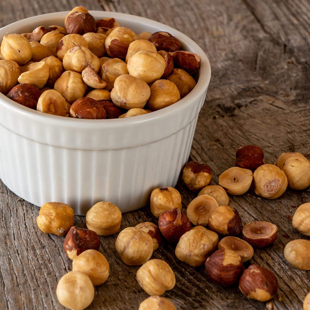 Premium Growers hazelnuts inside a backpack pocket ready for hiking and on-the-go energy