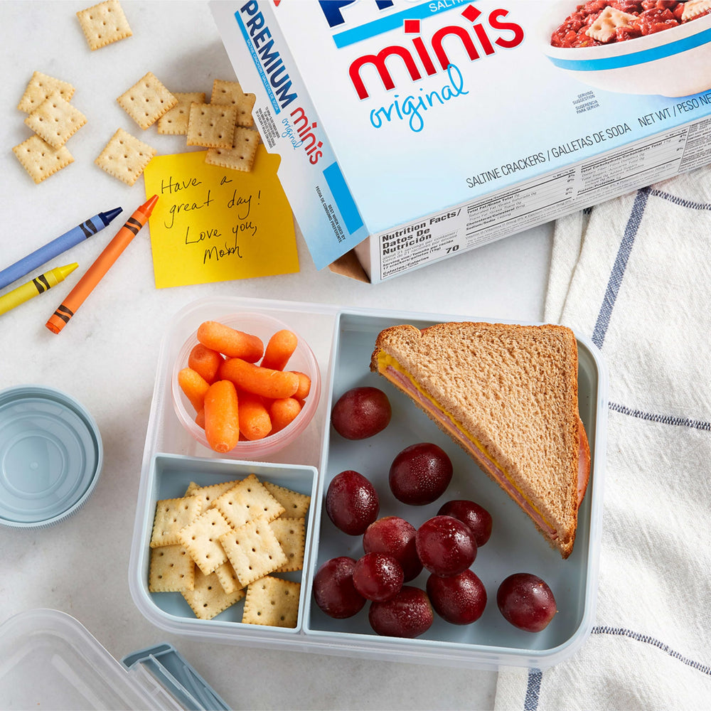 Premium mini saltine sealed box stack demonstrating airtight packaging that preserves crunch