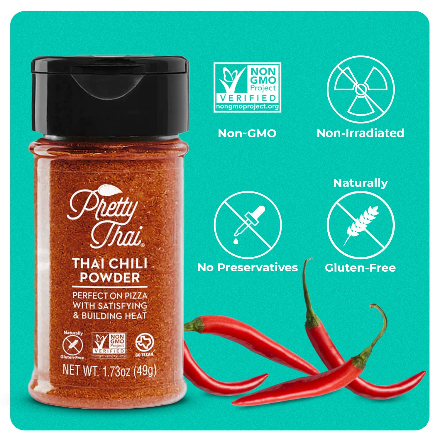 Pretty Thai jar beside teaspoon and lime for scale, helps visualize portion and use