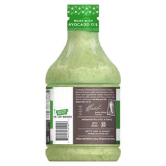 Primal Kitchen dressing drizzled on salad adding bright lime taste and rich avocado oil