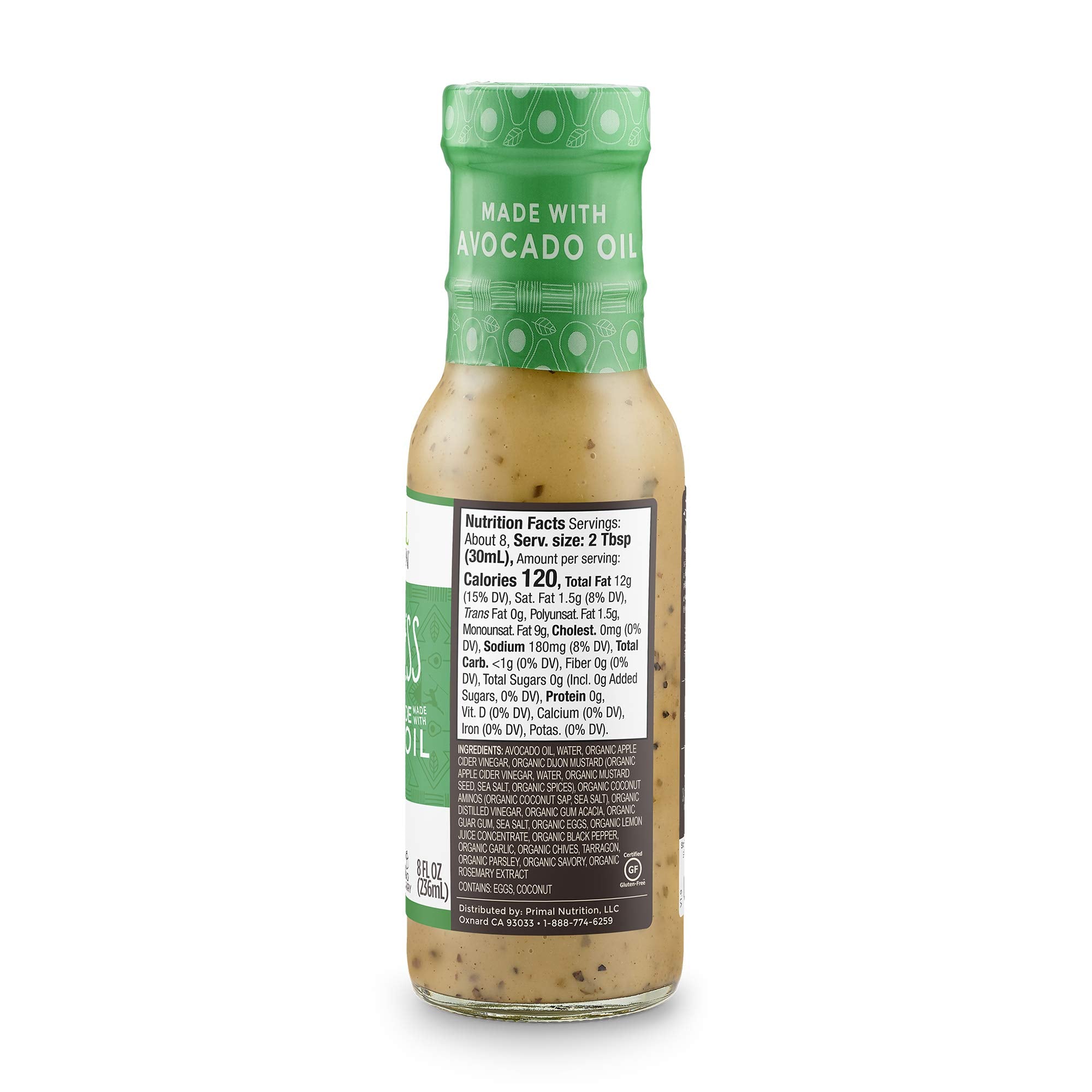 Primal Kitchen dressing poured onto salad adding creamy flavor and healthy fats