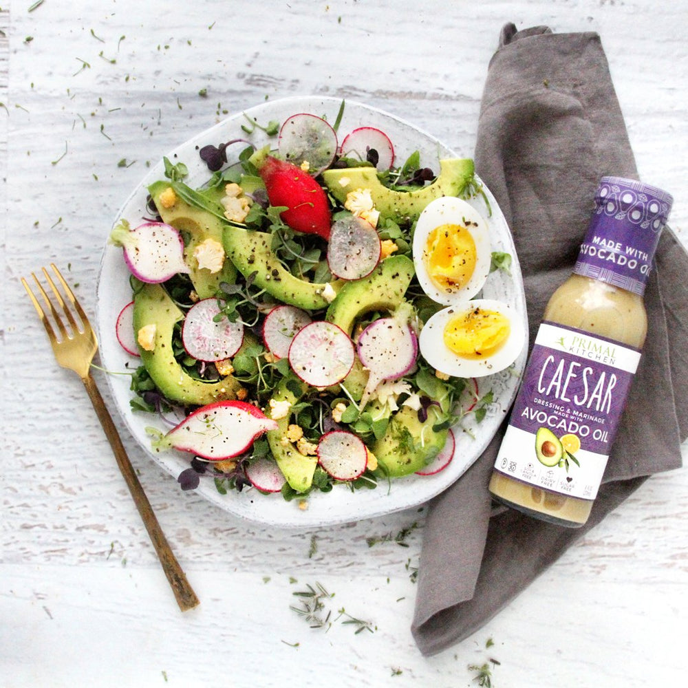 Primal Kitchen kitchen lifestyle serving bowl with dressing enhancing everyday meals