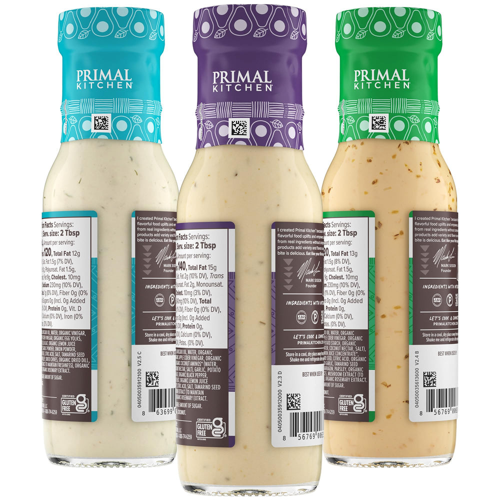 Primal Kitchen three bottles side by side displaying Ranch, Caesar, Green Goddess options