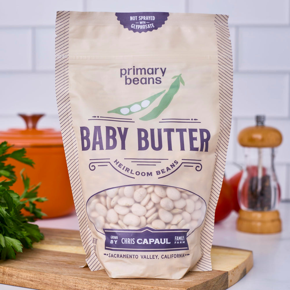 Primary Beans label and nutrition facts close-up showing non-GMO, vegan, additive-free benefit
