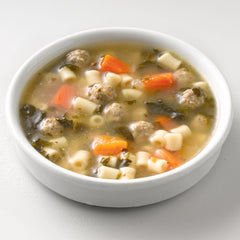 Progresso bowl of wedding soup beside toasted bread for comforting pairing